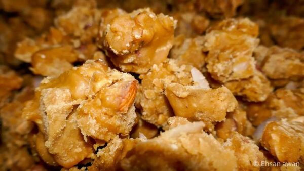 organic-dry-fruit-gur-jaggery-almonds Block of organic gur jaggery loaded with almonds cashews and nuts